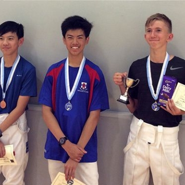 Men's U15 podium featuring Howard Wu (centre).