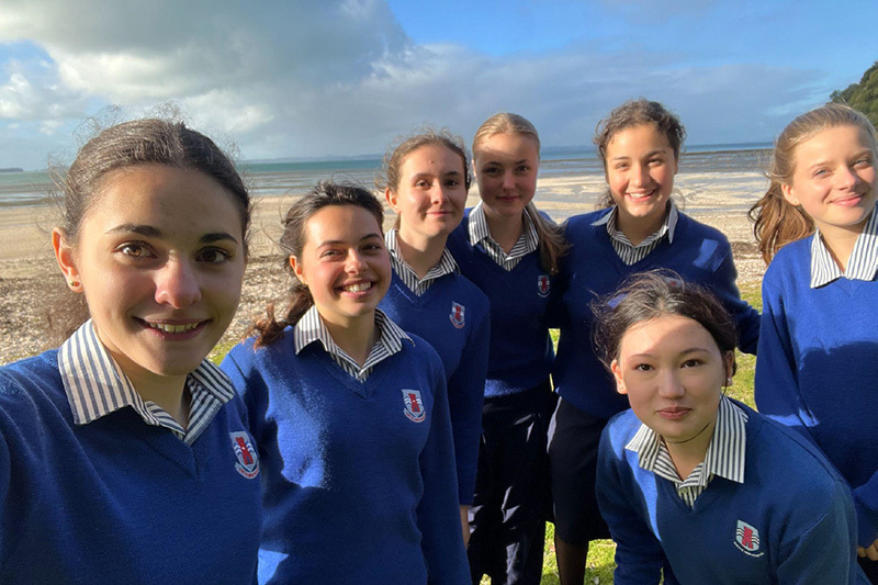 Macleans College international students relaxing at Eastern Beach