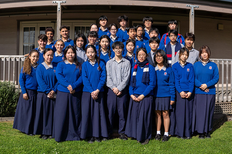 A group of Macleans College international students at graduation