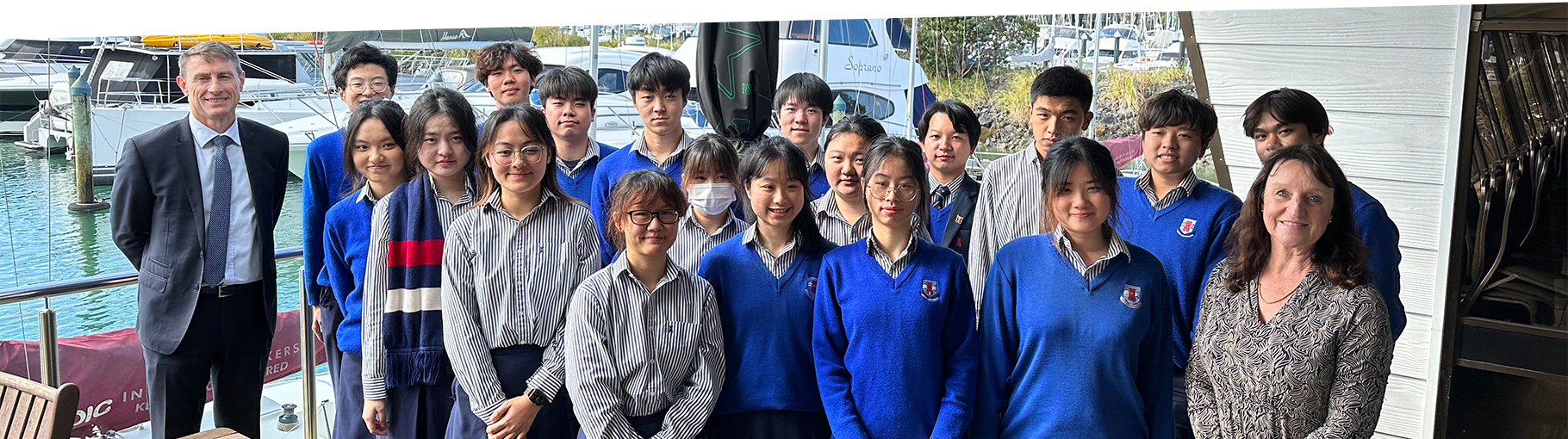 A group of Macleans College international students at graduation