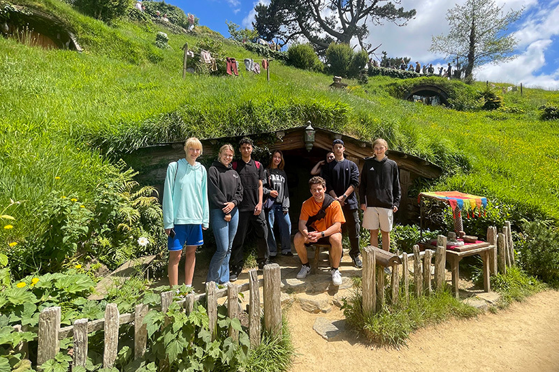 Macleans College international students exploring the Hobbiton movie set