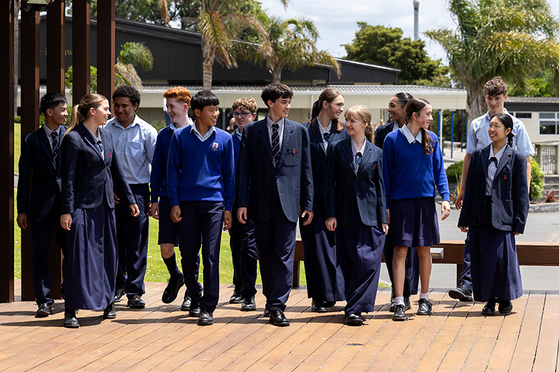 Junior and senior Macleans College students walking to class