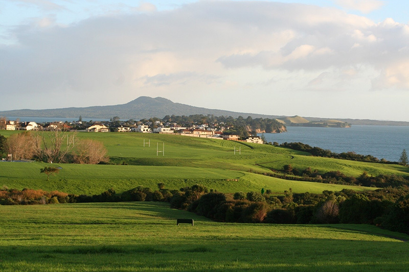 Overlooking the Macleans College sports fields towards Rangitoto Island